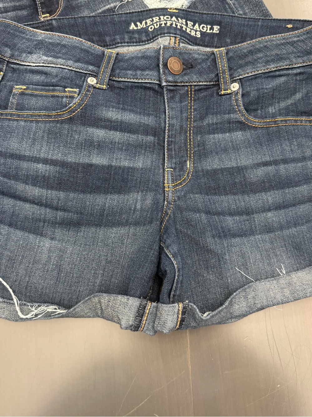 American Eagle Outfitters Blue Distressed Rolled-Hem Jean Shorts size 12